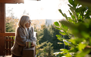 Graphic titled ‘Is It Time To Put Your House Back on the Market?’ with a checklist including key reasons such as market improvement, life changes, financial incentives, and property upgrades. Background includes a neutral, home-themed design.