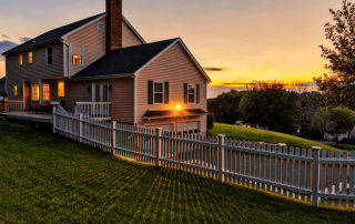 Beautiful suburban home at sunset illustrating the value and warmth of homeownership.